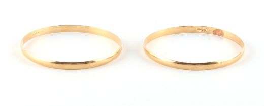 Property of a deceased estate - a pair of plain 18ct yellow gold bangles, approximately 29.4 grams