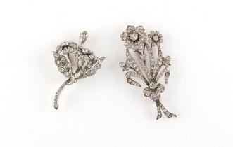 Property of a lady - HAROLD ARTHUR LAZARUS - a silver & clear paste floral brooch, 60mm long;