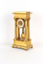 Property of a deceased estate - a large early 19th century ormolu portico clock, the two train