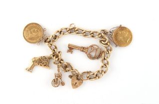 Property of a lady - a 9ct gold charm bracelet with heart shaped clasp, the five charms comprising