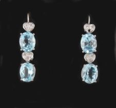 A pair of white gold blue topaz & diamond pendant earrings, each approximately 35mm long (2).