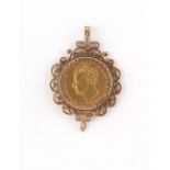 Property of a lady - gold coin - an 1825 George IV gold full sovereign, freely moving within a 9ct