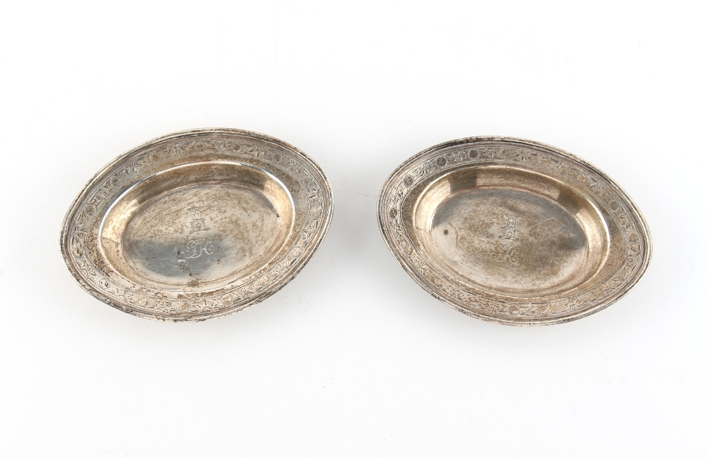 A pair of small George III silver oval dishes, each with engraved monogram & tower heraldic motif,