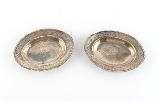 A pair of small George III silver oval dishes, each with engraved monogram & tower heraldic motif,