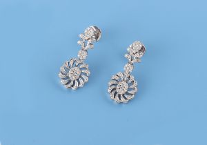 A pair of white gold diamond flowerhead pendant earrings, the estimated total diamond weight 2.0