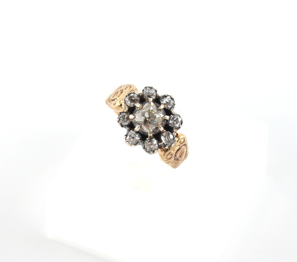 A 19th century unmarked yellow gold diamond cluster ring, the estimated total diamond weight 1.25