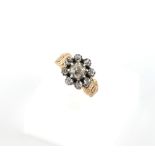 A 19th century unmarked yellow gold diamond cluster ring, the estimated total diamond weight 1.25