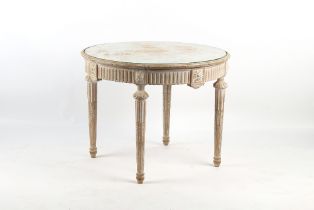 Property of a lady - a Louis XVI style painted circular topped centre table, with frieze drawer, the