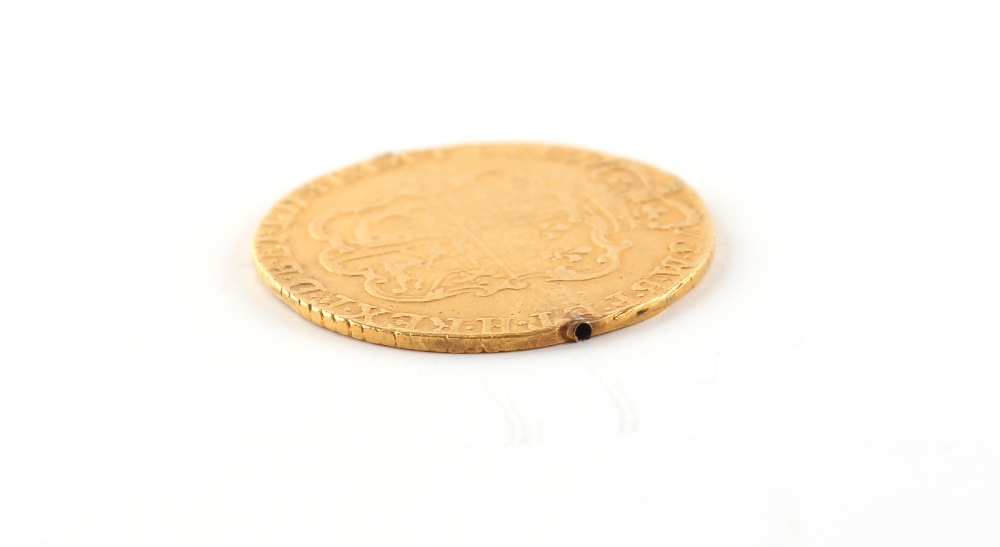 Property of a lady - gold coin - a 1773 George III gold guinea, shield back, small drilled hole to - Image 3 of 3