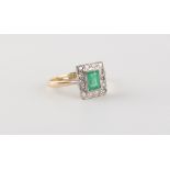 An Art Deco style 18ct yellow gold emerald & diamond rectangular panel ring, the rectangular cut