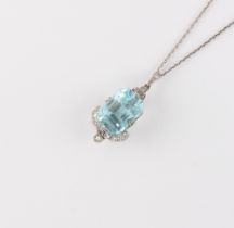 An Art Deco style aquamarine & diamond pendant, the octagonal cut aquamarine weighing