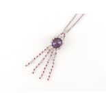 Property of a lady - an 18ct white gold amethyst ruby & diamond pendant on chain necklace, the