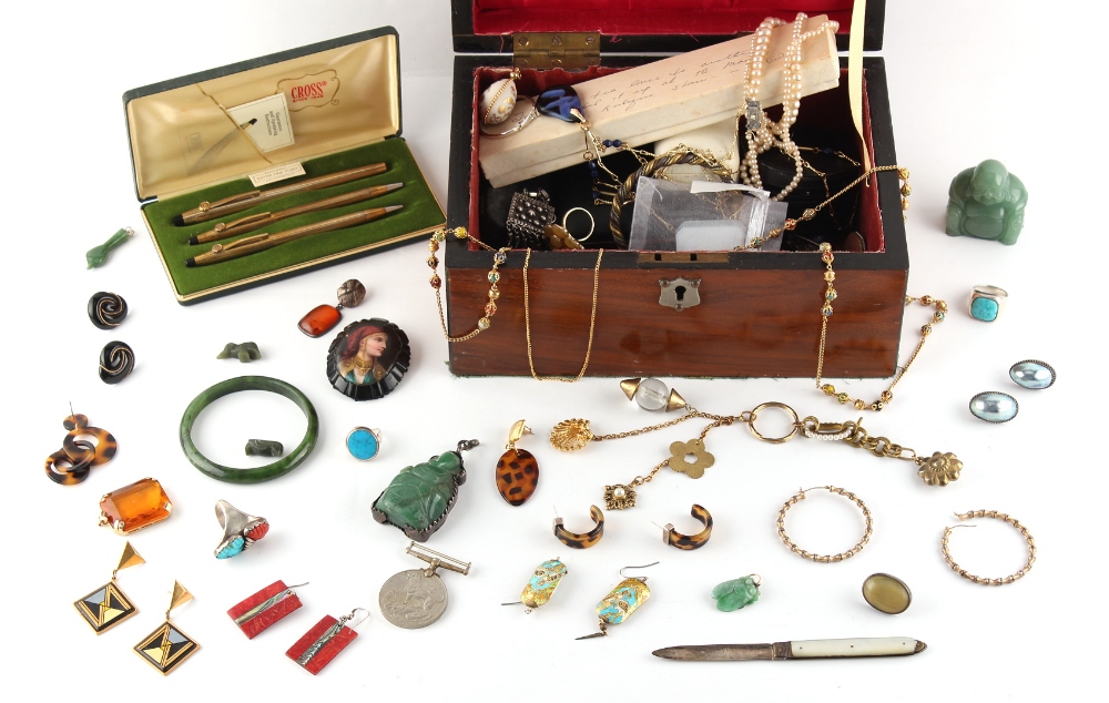 Property of a deceased estate - a box containing assorted costume jewellery including jade items,