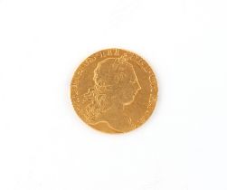 Property of a lady - gold coin - a 1773 George III gold guinea, shield back, small drilled hole to