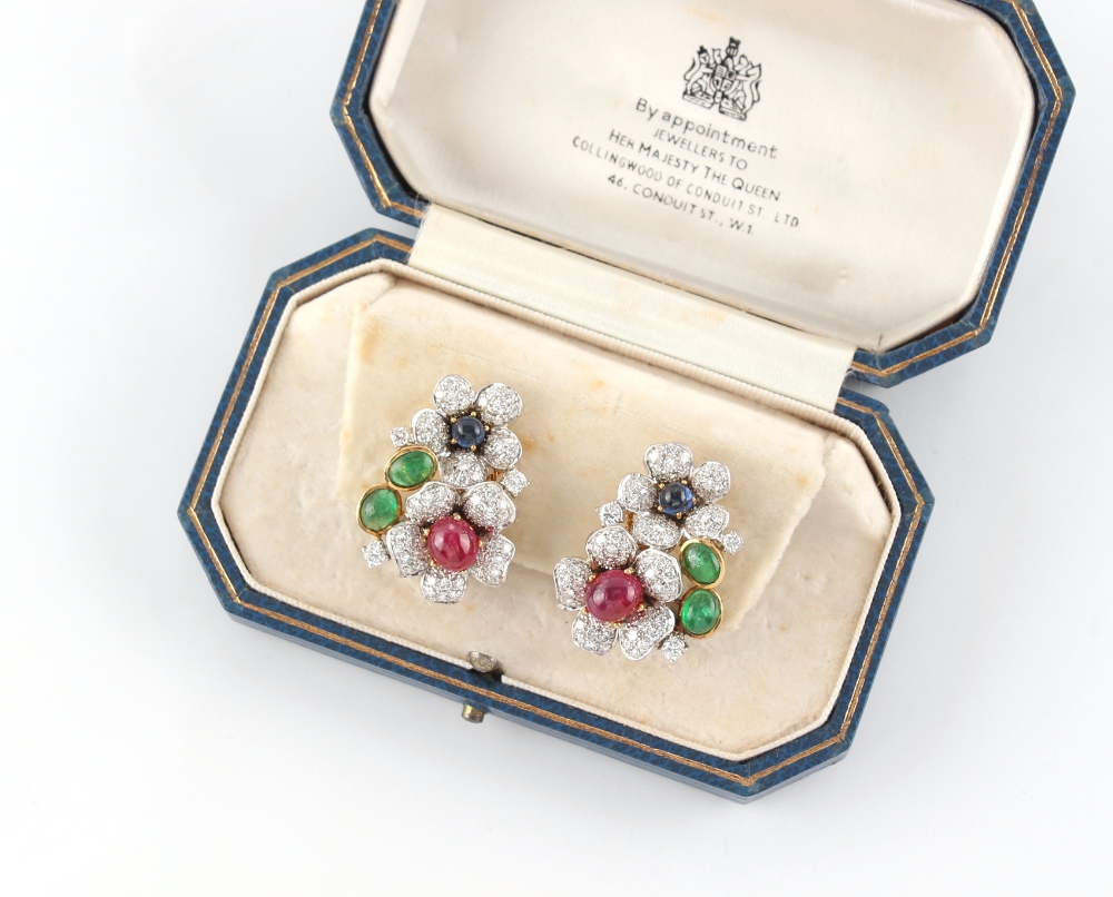 A fine pair of Continental white & yellow gold multi gem set floral cluster earrings, the diamond