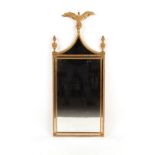 Property of a gentleman - a Regency style gilt framed pier mirror, with eagle cresting, 48ins. (