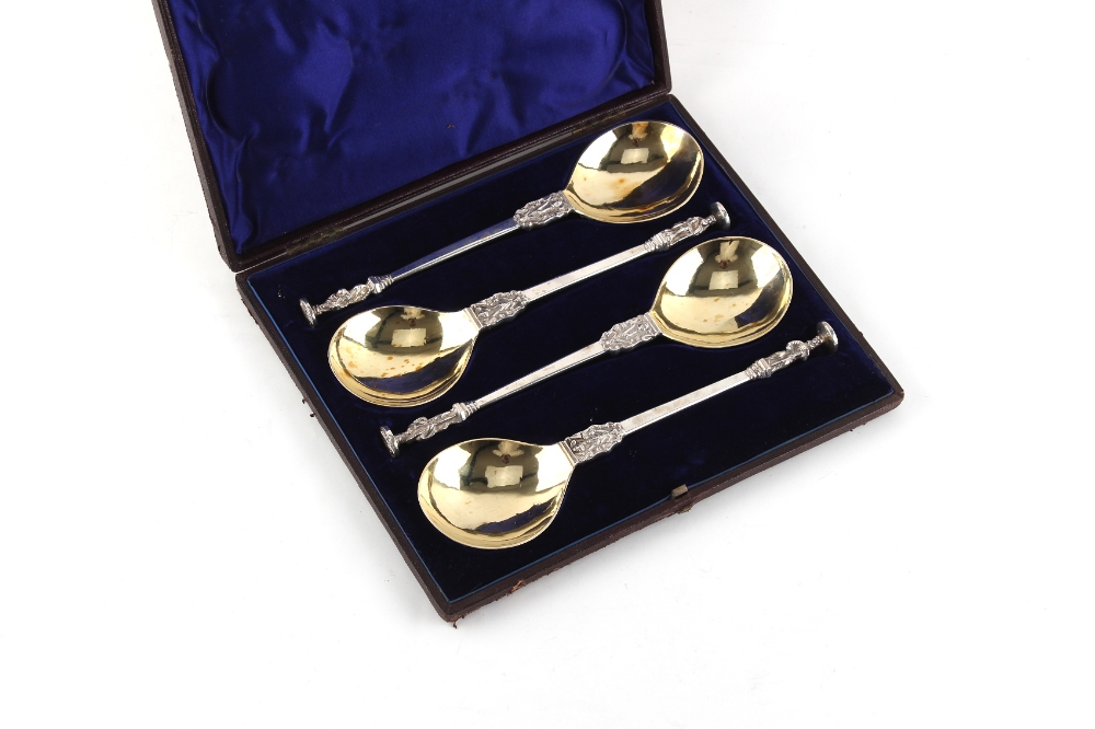 Property of a lady - a set of four silver Apostle spoons with gilt fig shaped bowls and seal