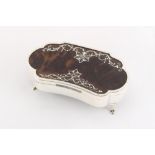 An early 20th century silver & tortoiseshell shaped jewellery box, with lined interior & hoof