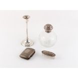 Property of a deceased estate - a modern silver candlestick; together with a silver cigarette