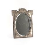 Property of a deceased estate - an Edwardian silver easel framed oval dressing table mirror,