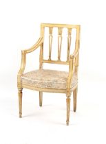 Property of a deceased estate - a late 19th century cream painted & parcel gilt open armchair,