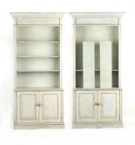 Property of a lady - a pair of modern painted bookcases, each 46ins. (117cms.) wide (overall) (2).