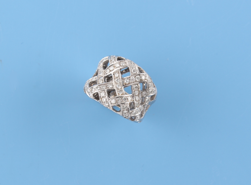 A modern 18ct white gold diamond lattice work ring, the estimated total diamond weight 1.75