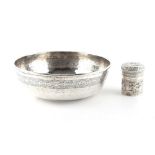 Property of a gentleman - an unmarked Indian silver (tested) bowl, with engraved band, the centre