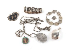 Property of a lady - a quantity of silver jewellery comprising a silver locket on long silver chain,