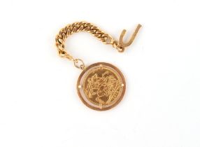 Property of a lady - a 1912 George V gold full sovereign pendant suspended from a flat curb link