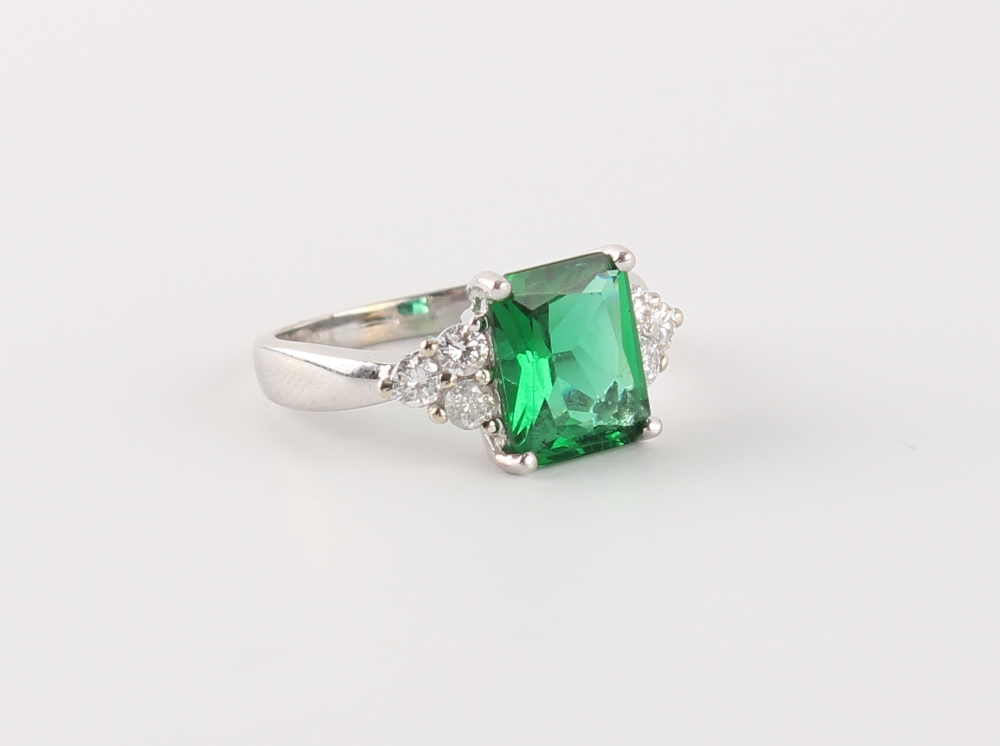 A 14ct white gold green stone (not emerald) & diamond ring, the estimated total diamond weight 0. - Image 2 of 2