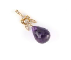 An unmarked yellow gold amethyst & diamond pendant, the large faceted pear shaped amethyst