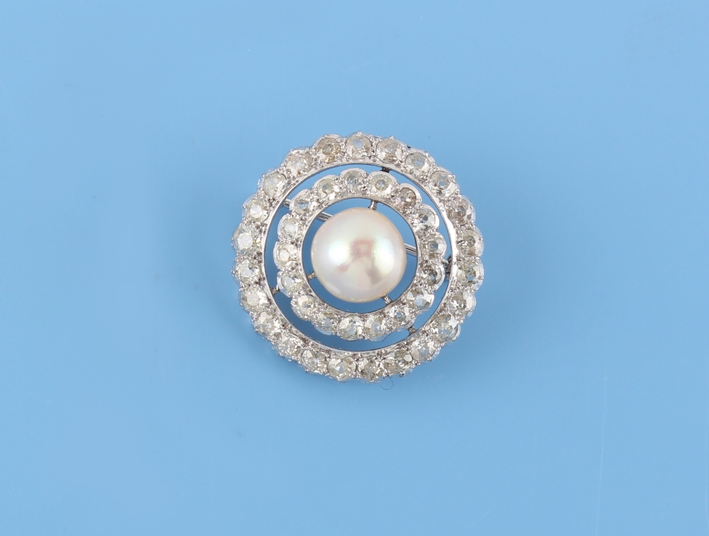 A large certificated natural saltwater pearl & diamond target brooch, the natural saltwater pearl