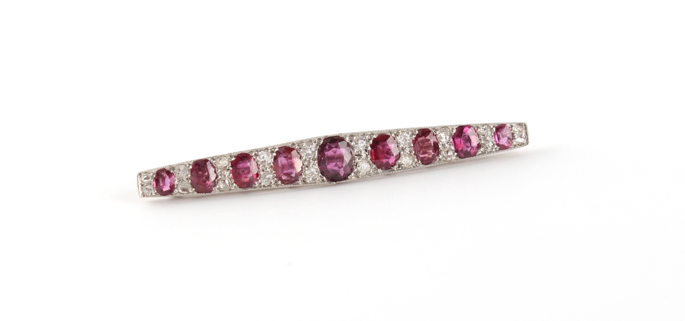 An Art Deco ruby & diamond long brooch, the nine oval cushion cut rubies weighing a total of - Image 2 of 3