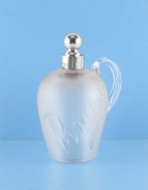 Property of a gentleman - a late Victorian silver mounted spirit jug, the ribbed glass engraved '