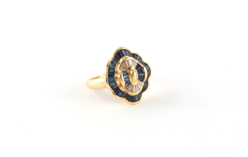 Property of a deceased estate - an 18ct yellow gold ring set with calibre cut diamonds &