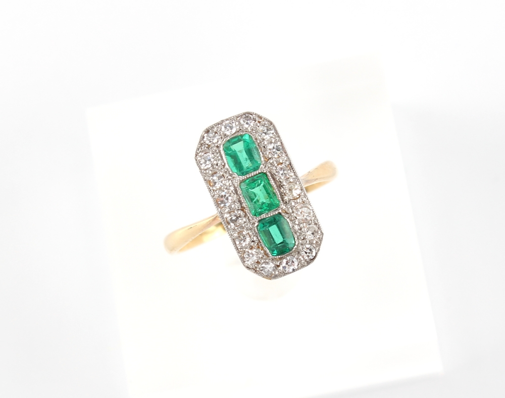 An Art Deco style yellow gold emerald & diamond ring, the elongated rectangular panel set with three - Image 2 of 2