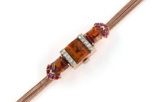 A lady's 14ct rose gold cocktail watch set with rubies, citrines and diamonds, approximately 20.0