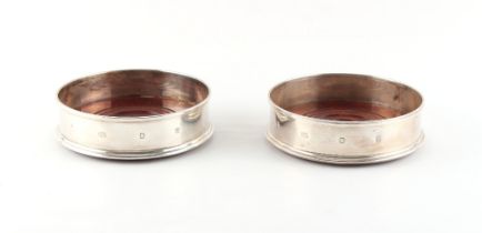 Property of a deceased estate - a pair of modern silver bottle coasters, M.C. Hersey & Son, London