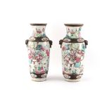 Property of a lady - a pair of Chinese crackle glazed vases, circa 1900, decorated with warriors