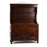 Property of a deceased estate - an 18th century George III oak two-part dresser, of good colour, the