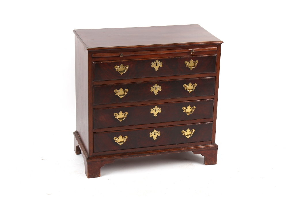 Property of a deceased estate - a small mahogany chest of four long graduated drawers with