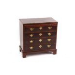 Property of a deceased estate - a small mahogany chest of four long graduated drawers with