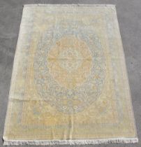 Property of a lady - a fine Persian Qum silk carpet, with pale blue ground, signed to one end