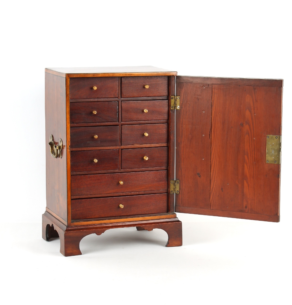 Property of a deceased estate - a mahogany table cabinet, parts George III, the single door