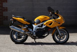 Property of a deceased estate - motorcycle or motorbike - a Suzuki SV650, yellow, registration