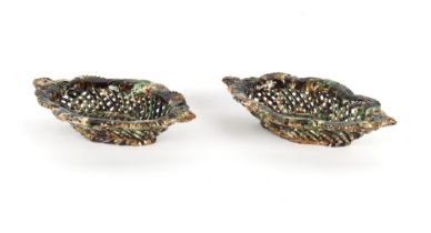 Property of a gentleman - a pair of 19th century Turkish Canakkale pottery pierced baskets, each