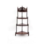 Property of a lady - a Victorian rosewood four-tier bow-fronted corner whatnot, with fretwork