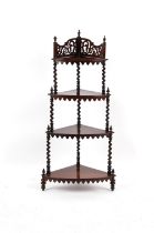 Property of a lady - a Victorian rosewood four-tier bow-fronted corner whatnot, with fretwork