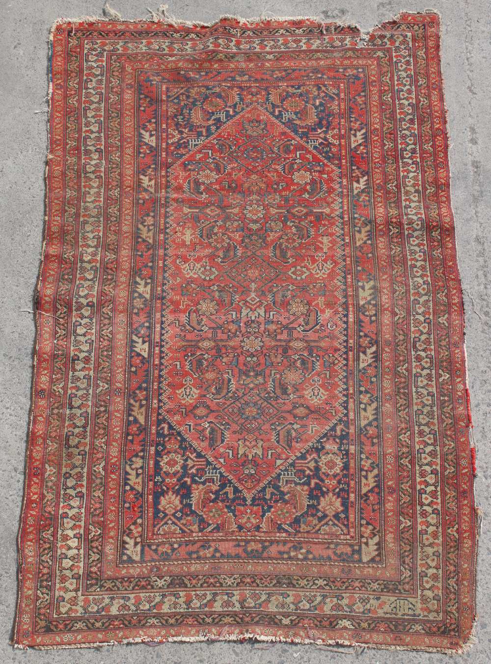 Property of a gentleman - an early 20th century Persian Qashgai rug, decorated with animal figures